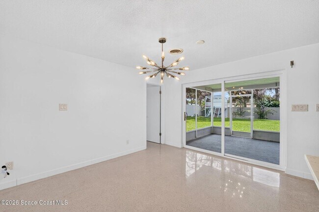 Building Photo - Welcome to this beautifully remodeled 4-bedroom, 3-bath home in the heart of Indialantic Beach!