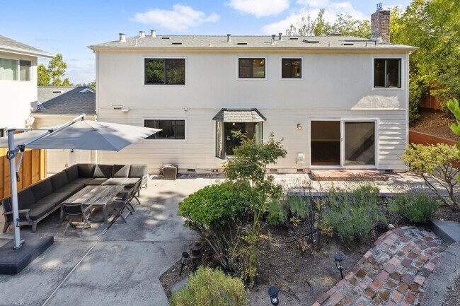 Building Photo - Elegant Two-Story Home with Backyard Oasis...