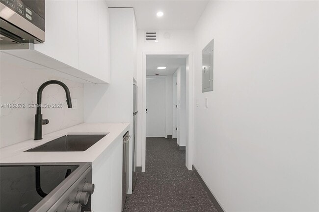 Building Photo - 9920 Collins Ave