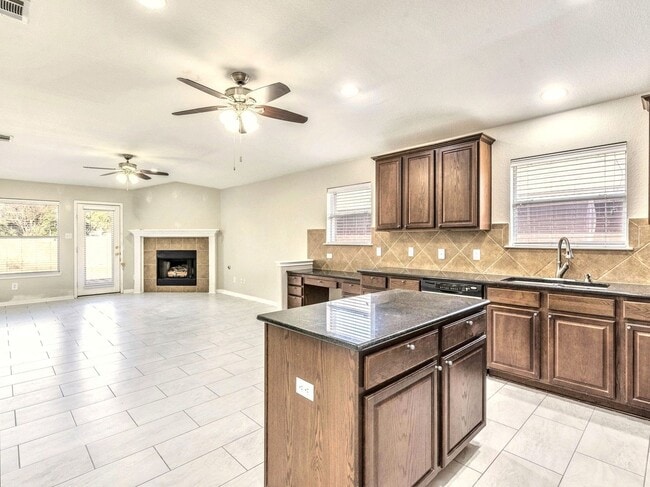 Building Photo - Comfortable 3BR / 2BA Home with Fireplace, Natural Light & Private Backyard