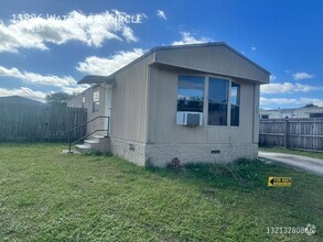 Building Photo - Beautiful 2/1.5 with fenced yard Mobile Ho...