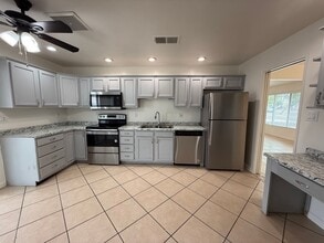 Building Photo - 4 Bedroom Home with Large Backyard | Modern Landscaping | Utilities Included