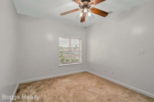 Building Photo - 4 br, 2.5 bath House - 1950 Woking Court