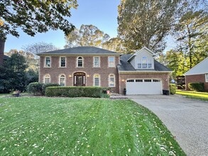 Building Photo - Fabulous 4-Bedroom Home w/2-Car Attached Garage! Dog Friendly - Screened Porch!