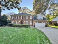 Building Photo - Fabulous 4-Bedroom Home w/2-Car Attached Garage! Dog Friendly, Screened Porch!