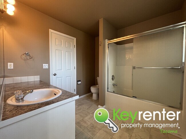 Building Photo - Elegant Browns Point Living with Backyard ...