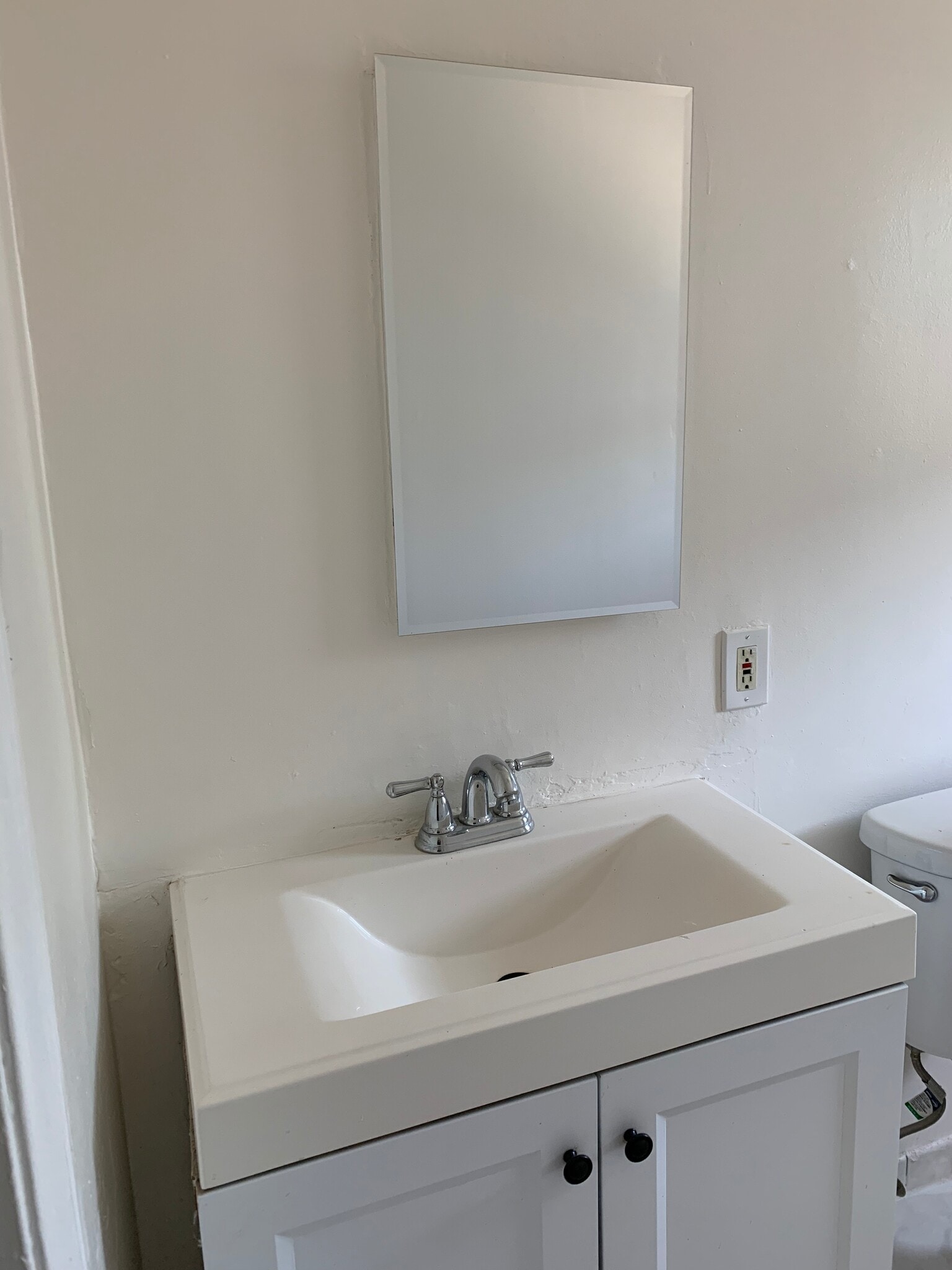 bathroom mirror - 9044 Hubbard St