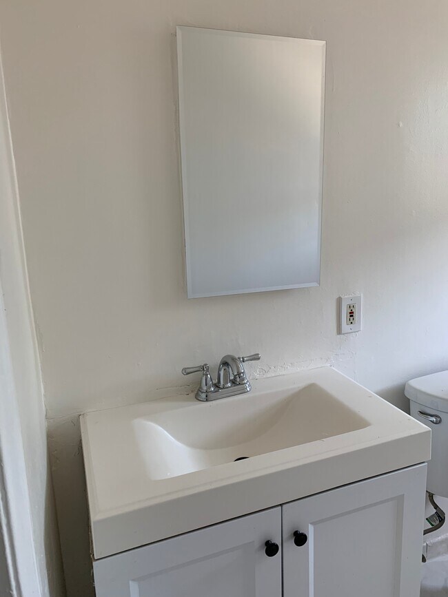 bathroom mirror - 9044 Hubbard St