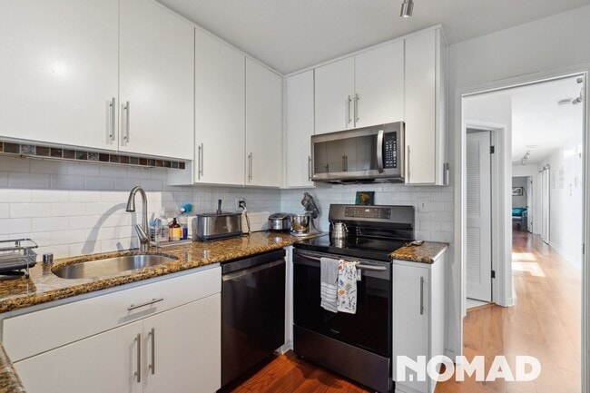Building Photo - Inviting 4BR Urban Oasis in Central SF – V...