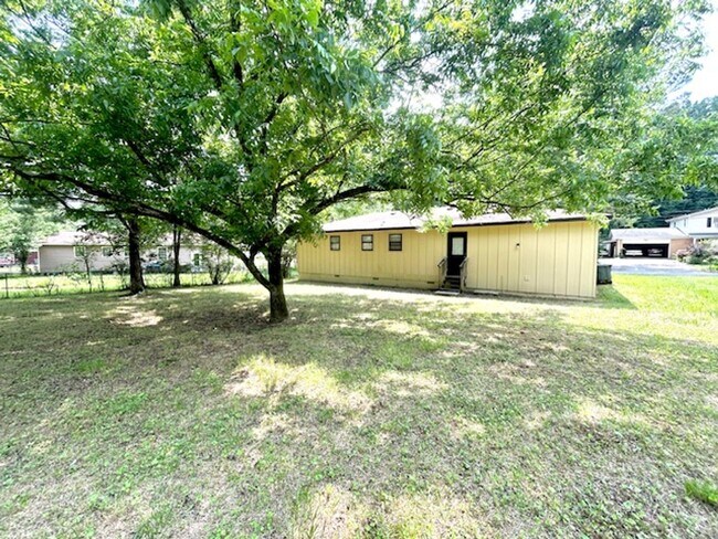Building Photo - Spacious 4-Bedroom, 2-Bath Home Located in...