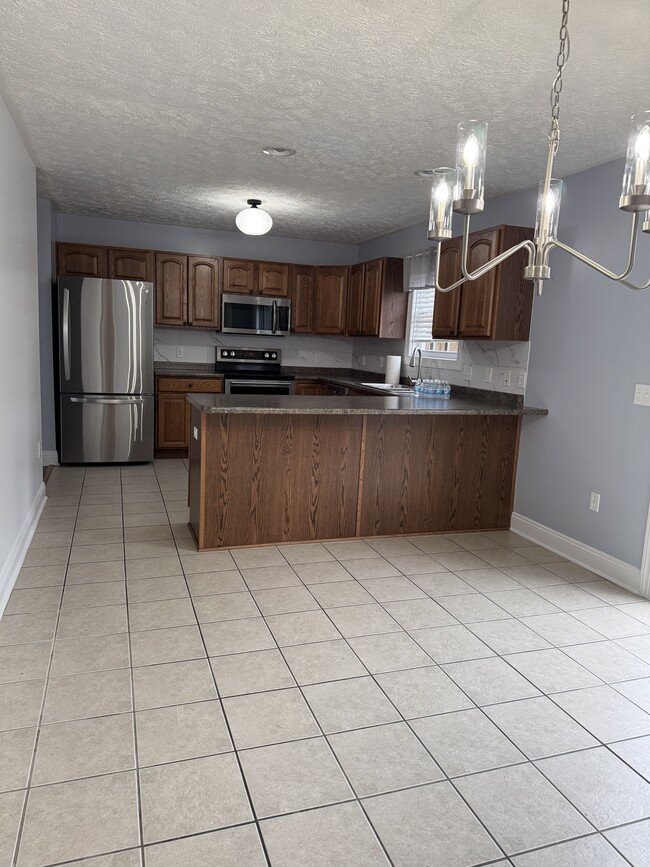 Building Photo - 590 Tall Oak Blvd NW