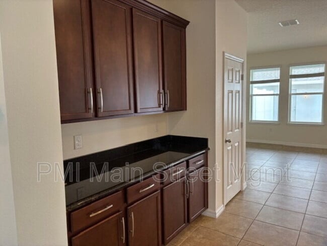 Building Photo - 8130 Red Stopper Ln