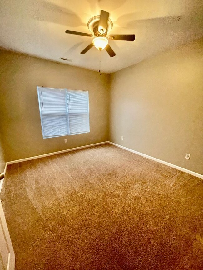 Building Photo - This two-story, 4-bedroom, 2-bath duplex in Fort Mill, SC sits on a corner lot