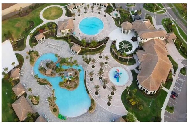 Building Photo - BEAUTIFUL CHAMPIONS GATE 2 BED 2 BATH COND0  w/GARAGE - FULLY FURNISHED - 12 MONTH RENTAL