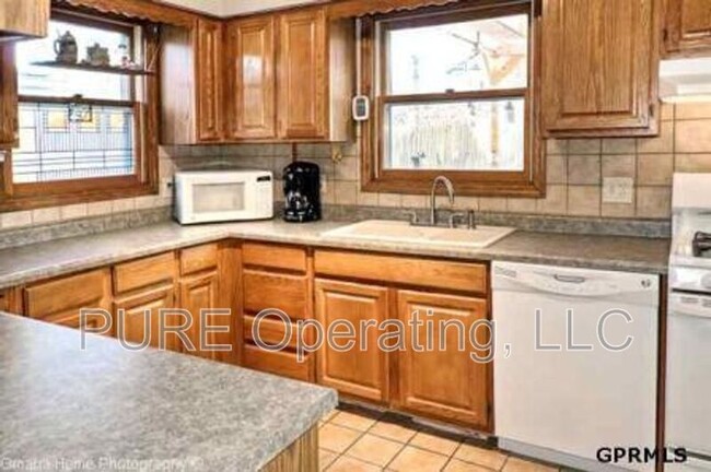 Building Photo - 1009 N 49th Ave