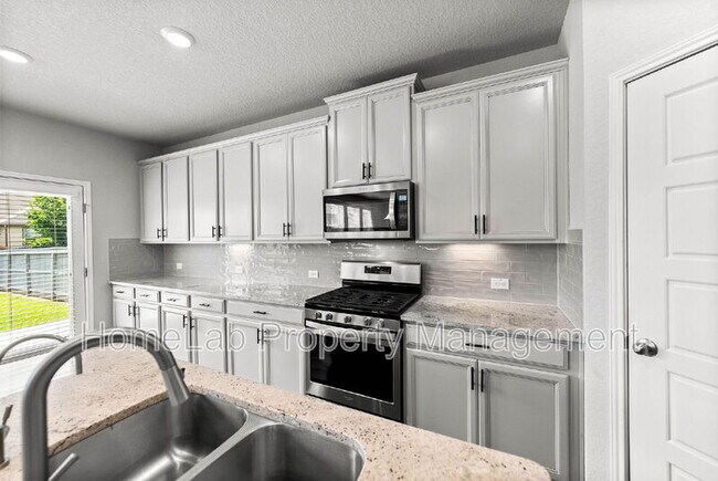 Building Photo - 9706 Novacek Blvd.