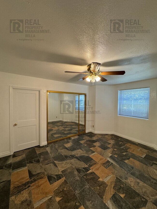 Building Photo - Peaceful Nuevo Living with Gated Driveway, Spacious Layout and Outdoor Living