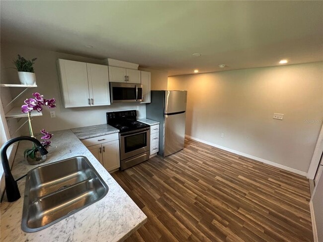 Building Photo - 1006 E 26th Ave