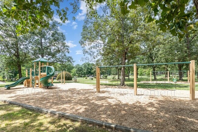 Building Photo - 6305 Trevor Simpson Dr
