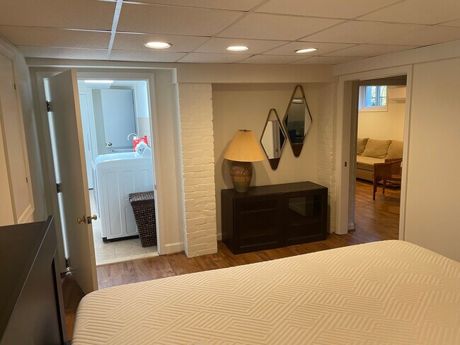 in unit full laundry with sink and storage area, entered from bedroom 1 - 1869 Park Rd NW