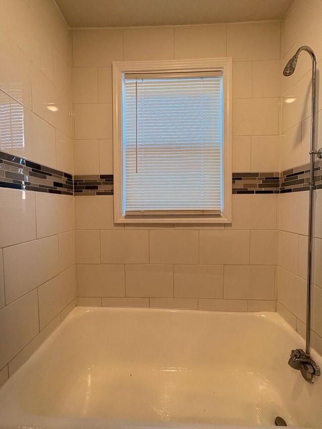 Building Photo - Live in Style without Breaking the Bank at Magnolias Living Apartments Washer & dryer in-unit