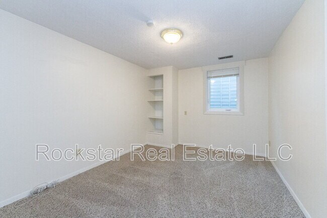 Building Photo - 12125 N Normandie St