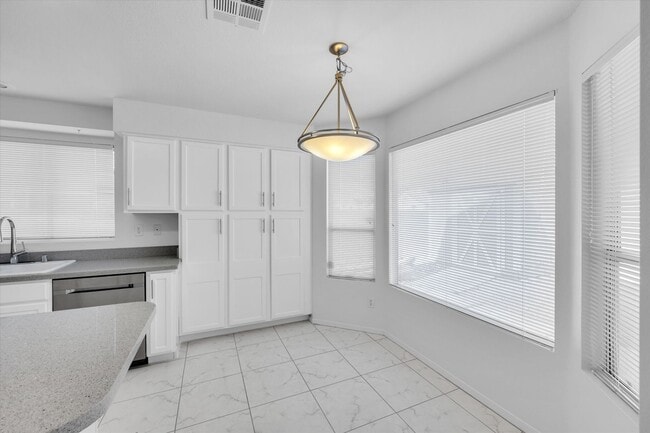 Building Photo - SE!!  Windmill and 215!! Newly remodeled!! All Tile Floors down stairs!! Low Maintenance Desert L...