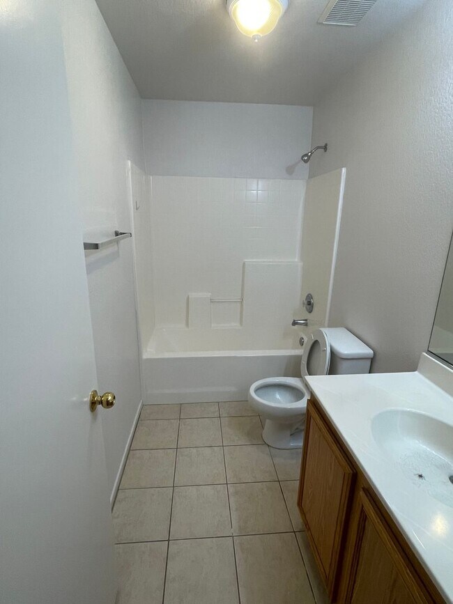 Building Photo - Adelanto Home-3 Bedrooms,2 Bathrooms, Laminate Floors, Indoor Laundry Room, Large Back Yard