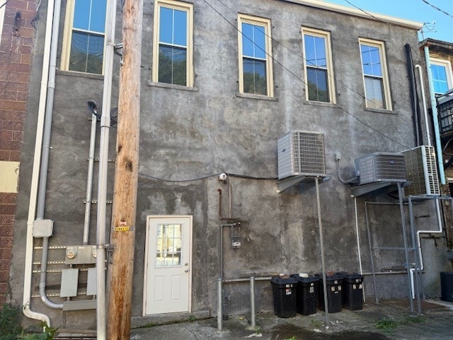 Back of Building With Door to Access Road - 206 E Main St