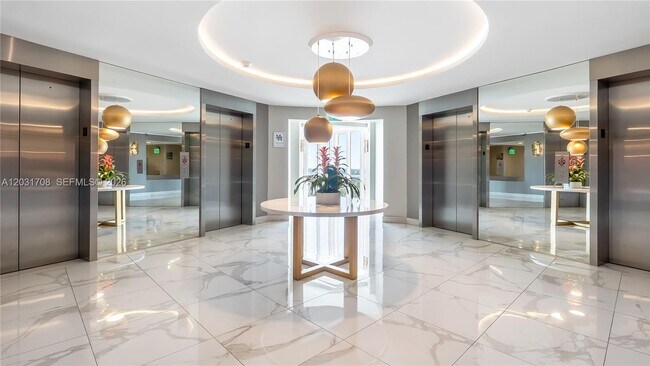 Building Photo - 10275 Collins Ave