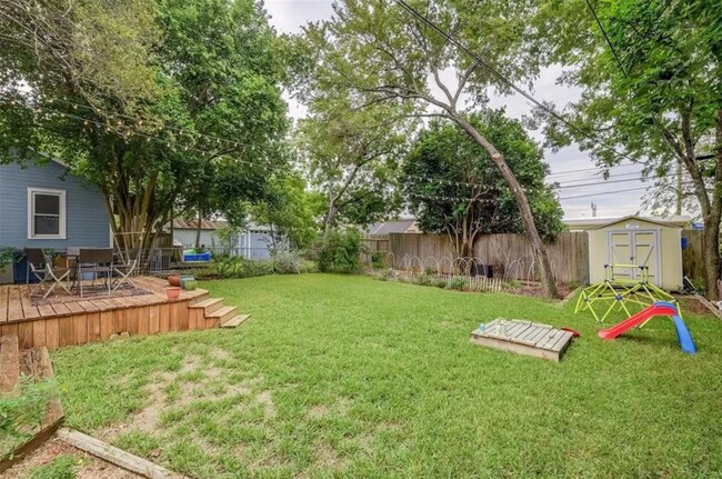 Building Photo - Discover Your Austin Oasis: Revitalized Bungalow with Hardwood Floors and Entertainer's Deck!