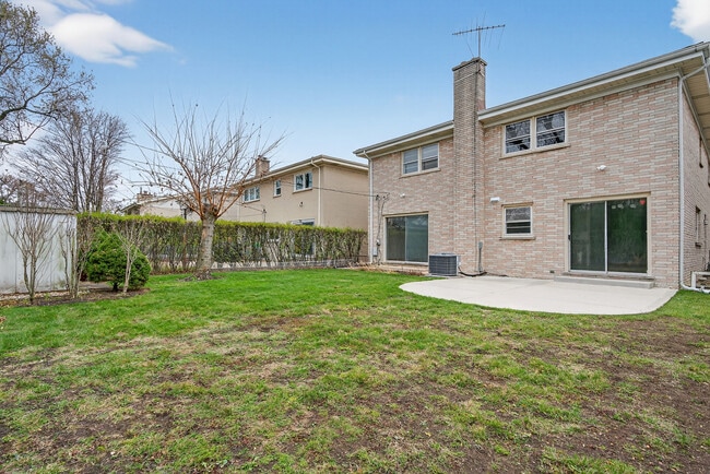 Building Photo - 7245 N Kostner Ave