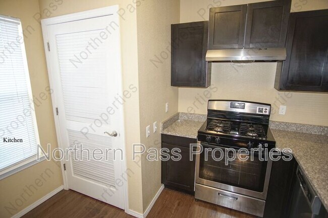 Building Photo - 8685 N Loop Dr