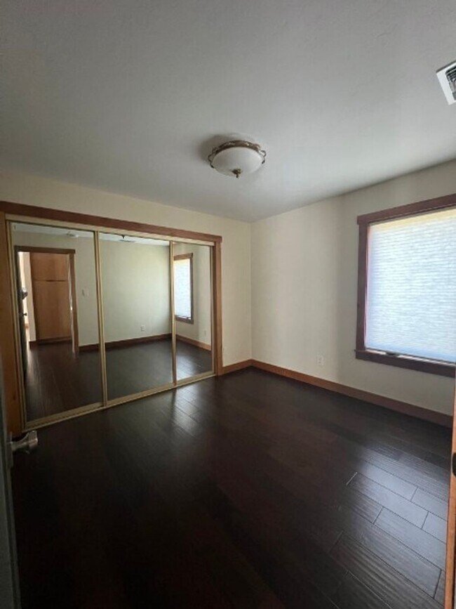 Building Photo - Artisan-Built Custom Cottage Retreat | Private Yard, Garage & EV Charging Ready