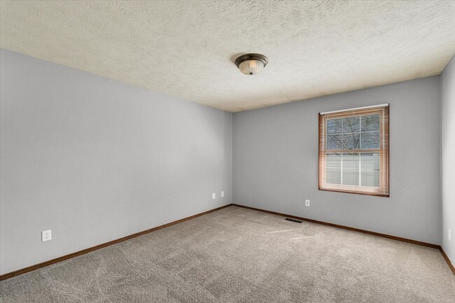 Building Photo - Luxurious & Expansive Duplex in Prime East Bloomington – Your Next Home Awaits!