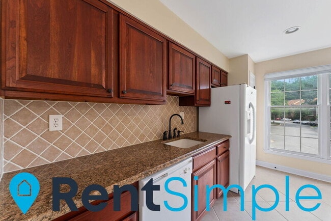 Building Photo - 6820 Wild Rose Ct