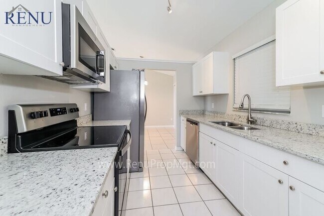 Building Photo - This Summer Special is Heating Up!: 50% of...