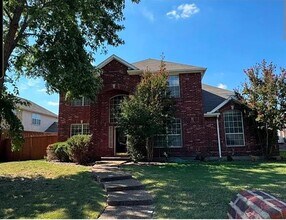 Building Photo - 5013 Goldenrod Dr