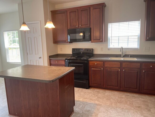 Building Photo - Spacious 4 Bedroom Home with Two-Car Garage in Swann's Mill Community