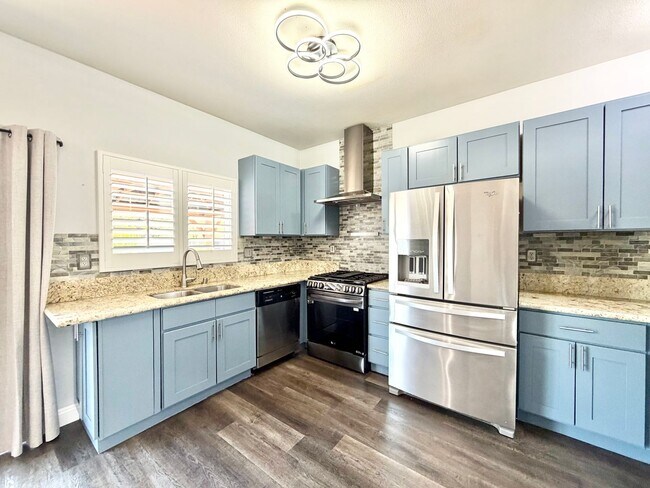 Building Photo - Beautifully Renovated 4 Bedroom Home with INCLUDED Solar, Large Backyard & Gazebo