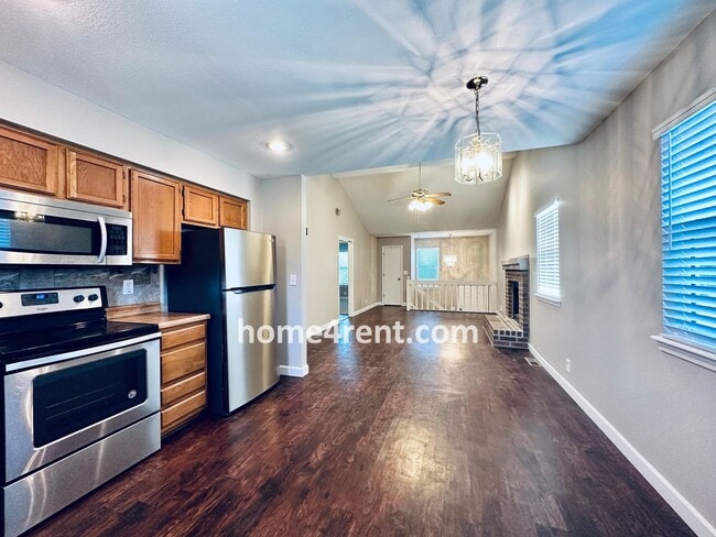 Building Photo - Updated Kitchen, Composite Deck and Refrig...