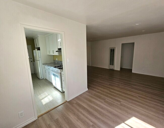 Living room to kitchen - 1749 S Carmelina Ave