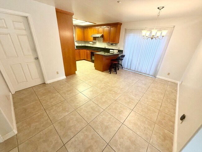 Building Photo - Spacious Modern Home with EV Charger, Solar & Gated 3-Car Garage