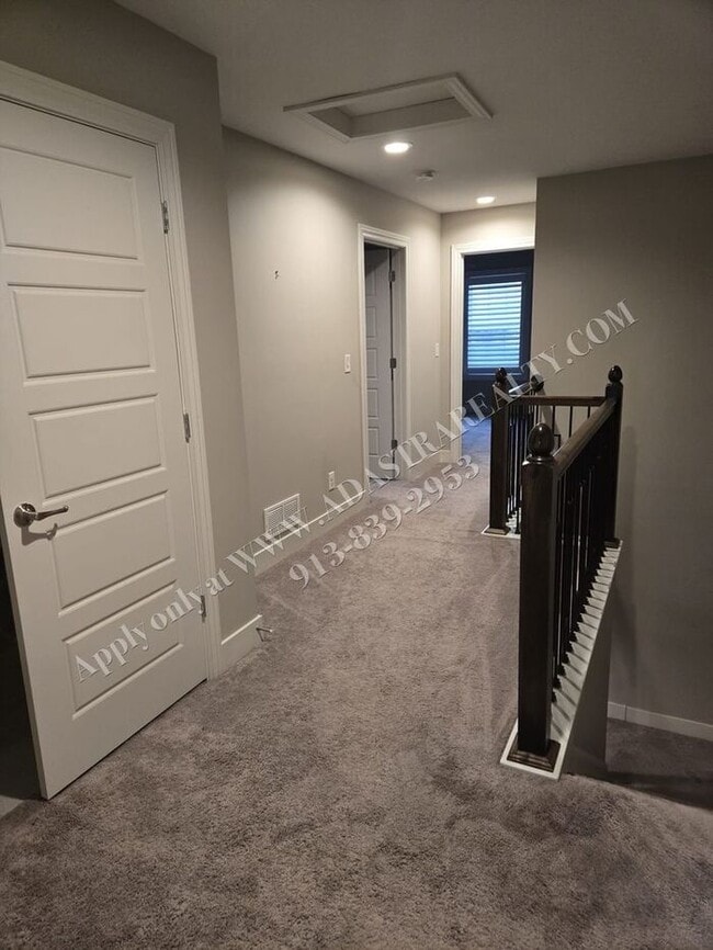 Building Photo - Beautiful Like New Townhome in De Soto-Coming SOON!!