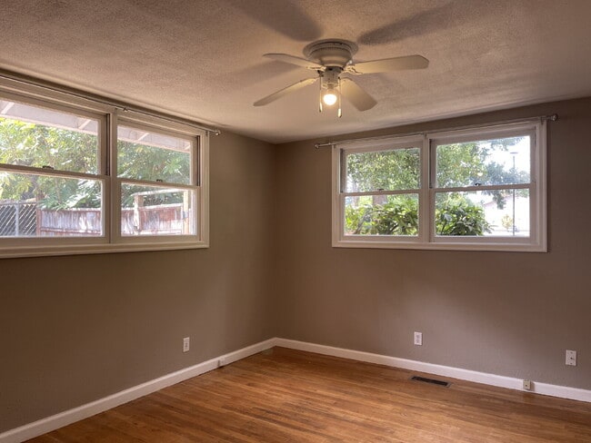 Building Photo - Spacious 3-Bedroom Home with Bonus Room & Two-Car Garage