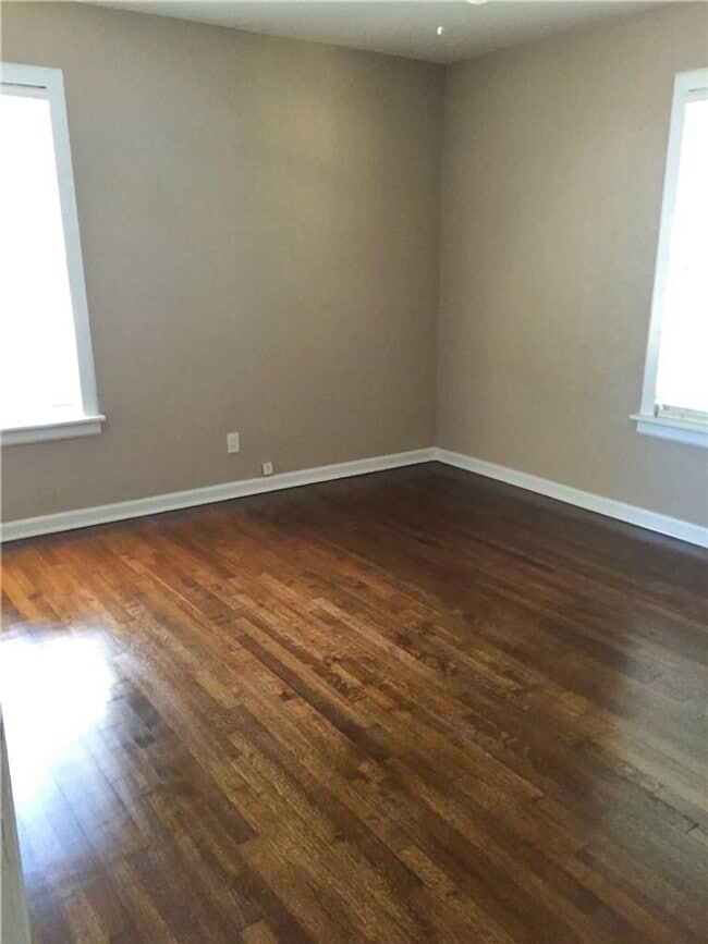 Building Photo - Remodeled 1 story home in Hurst with original plank wood flooring