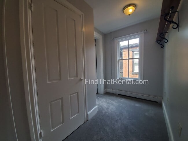 Building Photo - Charming Historic Retreat with Private Fenced Yard & Parking – Prime Downtown Location