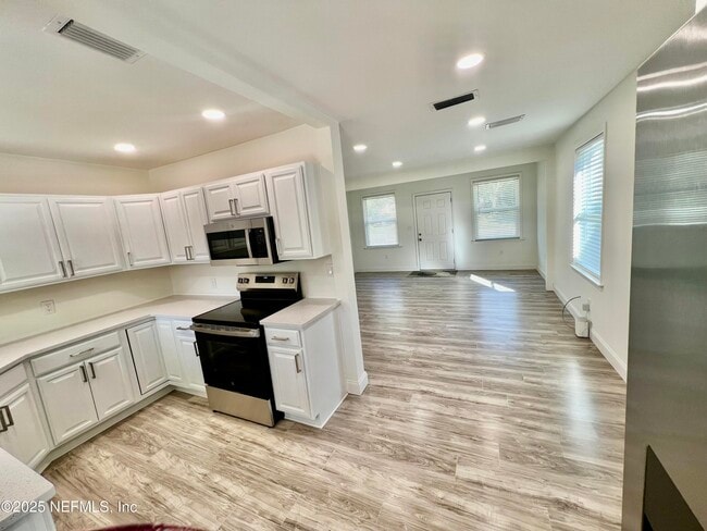 Building Photo - 9720 Jupiter Ct S