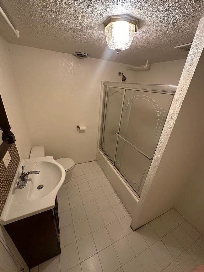 Building Photo - Ideally Located and Updated 4 Bed 2 Bath Fully-Fenced Home w/ Detached Garage/Shop!