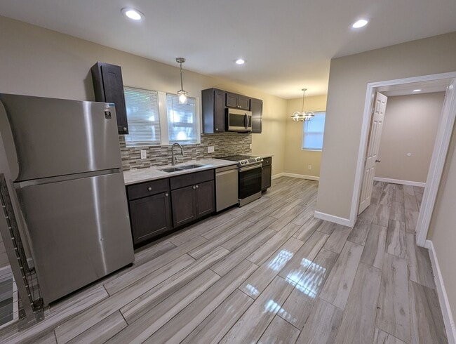 Building Photo - Greenway Glow-Up: Fully Renovated & Full o...